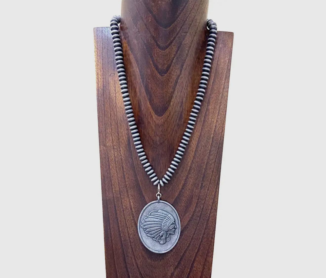 22 inches silver 10mm beaded necklace with Indian Pendant.