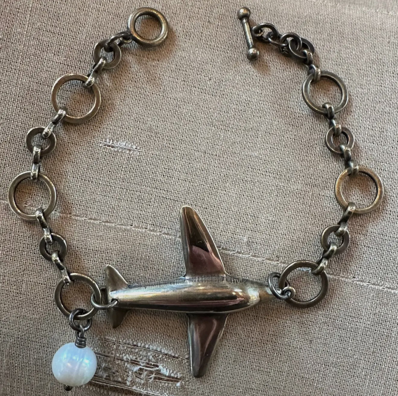 Airport lane to anywhere mixed metals bracelet.